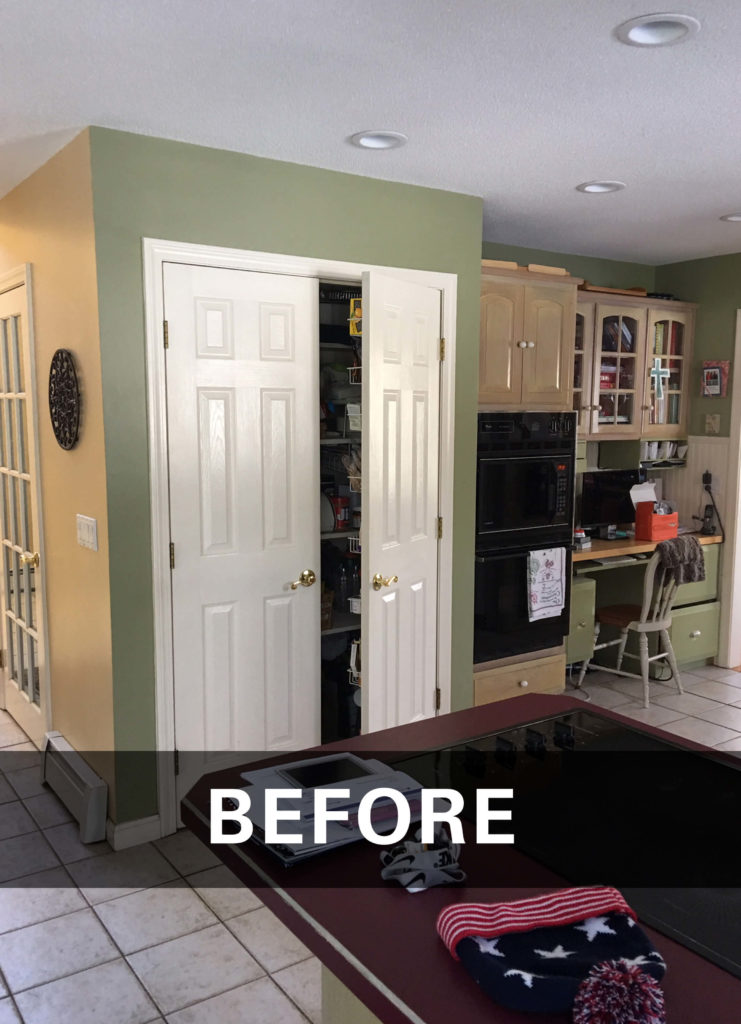 Burlington kitchen remodel before, showing pantry, oven, and desk area. The foreground shows a peninsula.