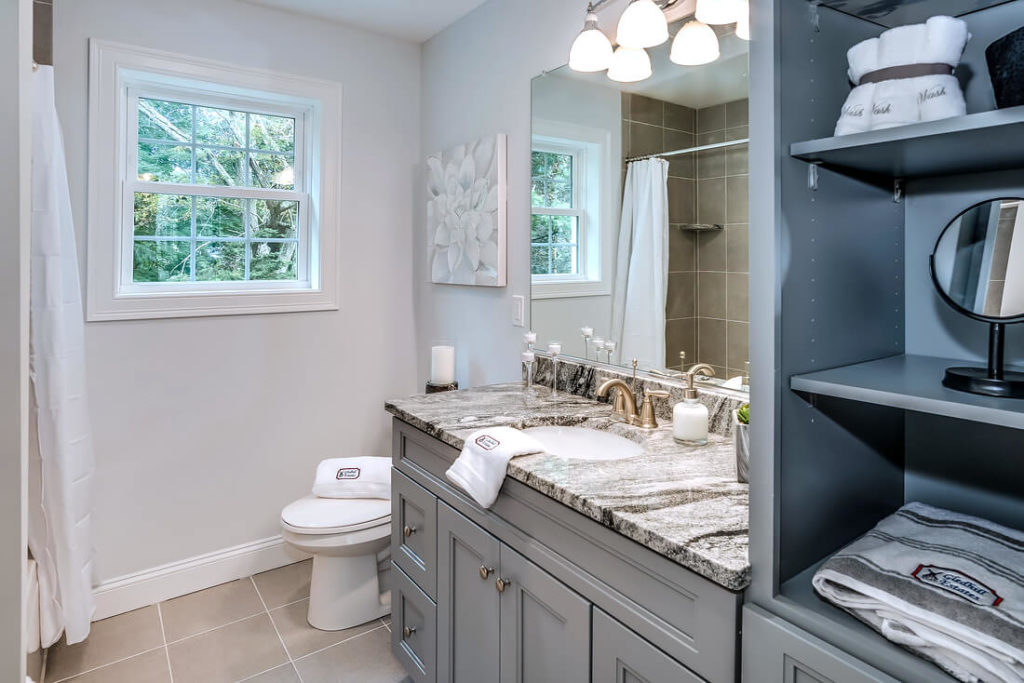 Detail view of bathroom vanity in optional grey installed by Viking Kitchens at Gledhill Estates.