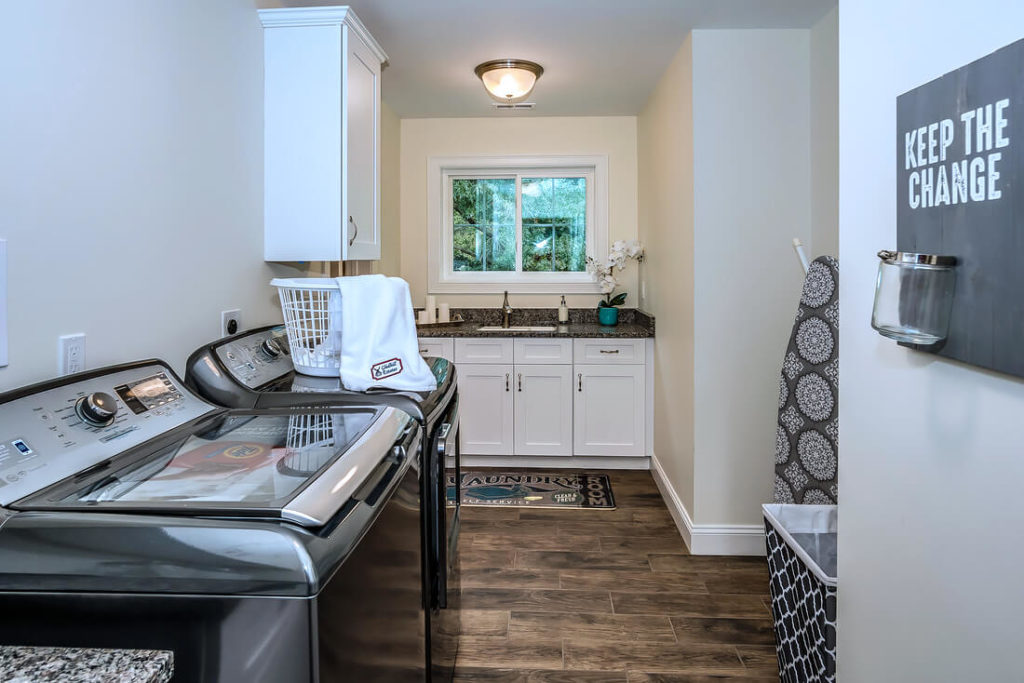 Basement sink cabinets installed by Viking Kitchens at Gledhill Estates.