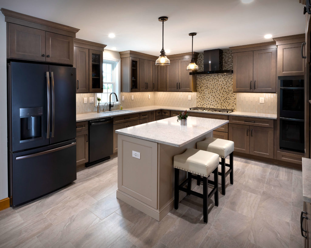 Rolling Fog Quartz counters, Diamond cabinetry and glass tile backsplashes.