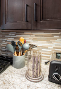 Cabinet, Backsplash and Counter Details: The backsplash is MSI Arctic Storm with Pewter Permacolor grout. The hardware is Berenson Hardware bar pulls in Slate. The counter is Cambria New Quay quartz.