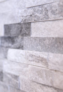 Detail of the fireplace tile AFTER work on this kitchen remodel in West Hartford.
